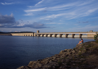 Table Rock Dam, as viewed from the hillside along Table Rock Lake, is located in Branson, Missouri, and impounds the White River