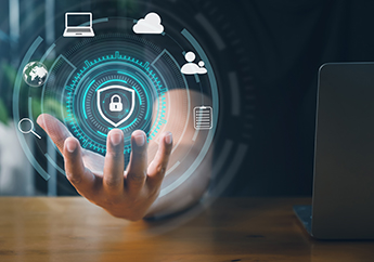 A hand holding a floating icon graphic interface showing secure firewall technology for online data access