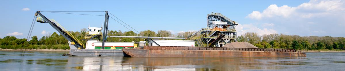 A barge floating down the Missouri River