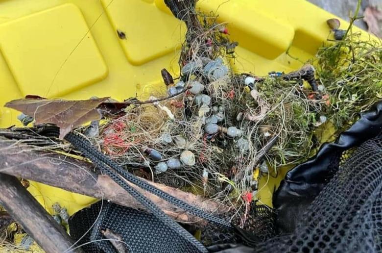 fishing line in a pile with weights tangled together