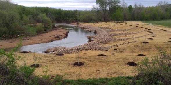 A use of stream management methods of re-sloping and longitudinal peaked stone toe protection