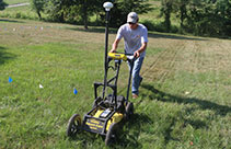 Staff operating a ground penetrating radar unit