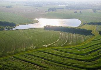 An aerial view of a Pettis County terrace with water nearby.