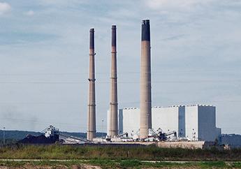 An operating coal-fueled power plant in Labadie, Missouri, featuring 3 stacks and a large plant building