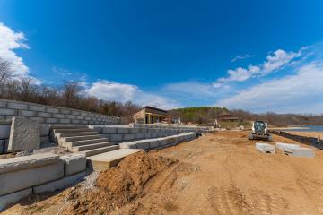 Construction of a retaining wall with steps at the beach in the Thousand Hills State Park.