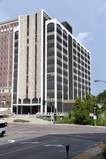 Outside front view of the S Hanley Building, known for its distinct exposed aggregate panels on the facade.