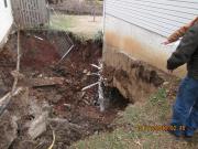 Abandoned mine collapses, damaging a homes foundation